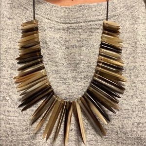 Noonday necklace Roar